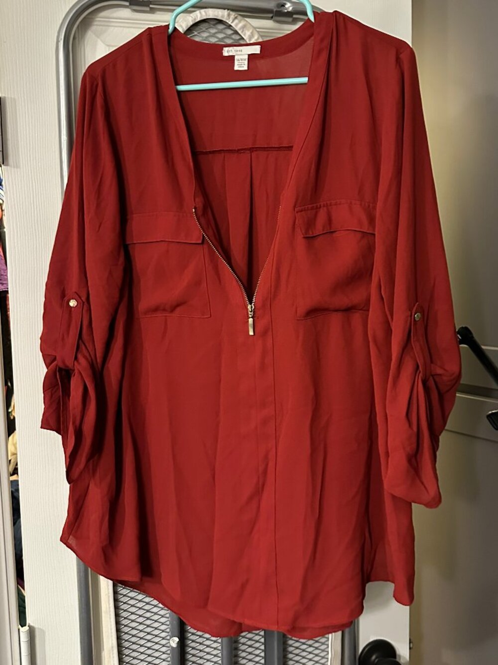 red roll tab sleeve blouse